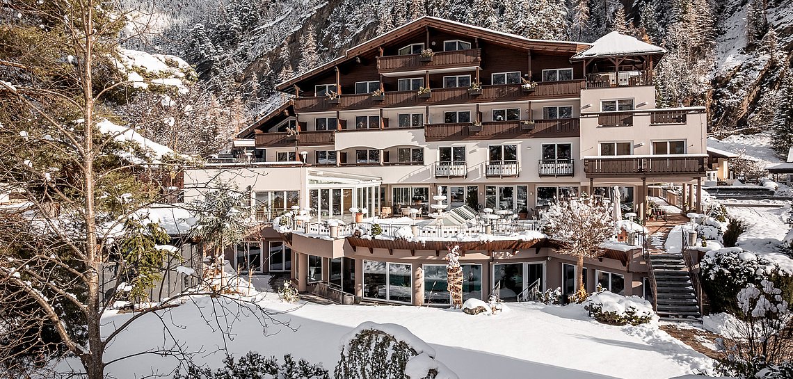 Hotelbild mit Garten im Winter